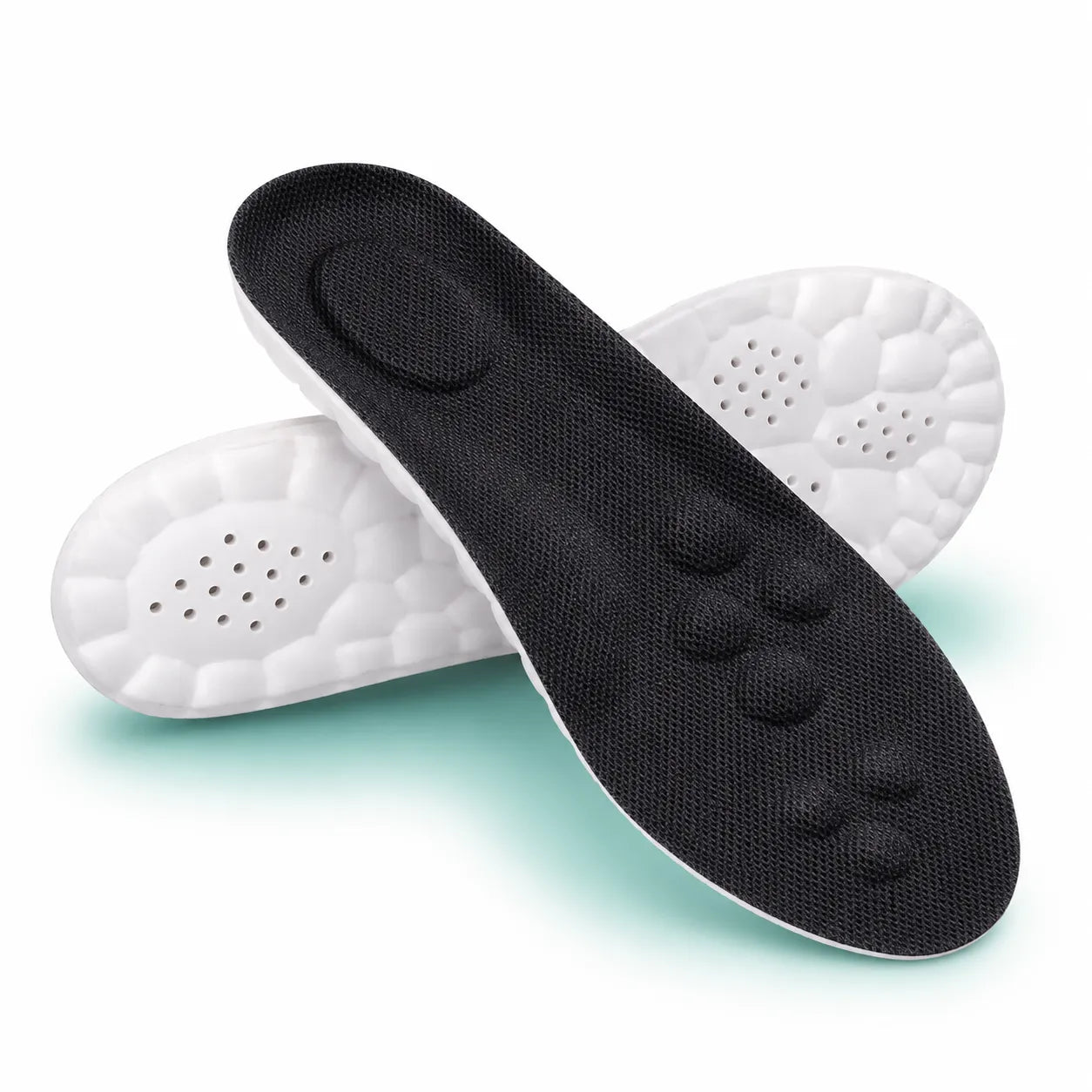 Black shoe insole with white sole on a light green background
