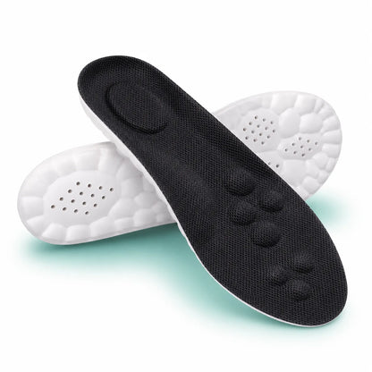 Black shoe insole with white sole on a light green background