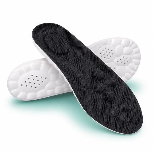 Black shoe insole with white sole on a light green background